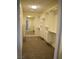 Large walk-in closet features custom shelving, drawers, and a full-length mirror for a luxurious feel at 4417 Rita Dr, Las Vegas, NV 89121