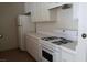 Bright kitchen with all-white cabinets, and plenty of countertop space for food prep at 4865 S Torrey Pines Dr # 106, Las Vegas, NV 89103
