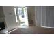 Neutral living room with an open doorway and a flood of natural light at 4865 S Torrey Pines Dr # 106, Las Vegas, NV 89103