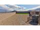 A low-maintenance backyard with gravel, artificial turf, and mountain views at 5204 Sunstone Mesa Dr, Las Vegas, NV 89166