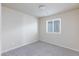 An airy bedroom featuring plush carpeting and a window providing natural light at 5204 Sunstone Mesa Dr, Las Vegas, NV 89166