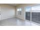 Dining area in the living room features a sliding door to the backyard at 5204 Sunstone Mesa Dr, Las Vegas, NV 89166