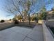 Private backyard features a large patio area and desert landscaping at 56 Belle Point Ave, Las Vegas, NV 89123