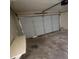 Empty garage with an automatic door at 5709 Goldmount Ave, Las Vegas, NV 89107