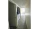Indoor hallway leading to laundry appliances at 5709 Goldmount Ave, Las Vegas, NV 89107