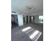 Bright living space with carpeted floors and natural light at 5709 Goldmount Ave, Las Vegas, NV 89107