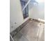 Private outdoor patio area with concrete flooring and privacy lattice for relaxing or entertaining at 5709 Goldmount Ave, Las Vegas, NV 89107