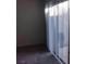 Indoor room with a sliding glass door covered by blinds at 5709 Goldmount Ave, Las Vegas, NV 89107