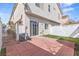 Private backyard with a brick patio and small lawn at 5908 High Steed St # 102, Henderson, NV 89011