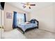 Cozy bedroom featuring soft lighting and large window at 5908 High Steed St # 102, Henderson, NV 89011