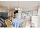 Kitchen/dining room combo with gray cabinets at 5908 High Steed St # 102, Henderson, NV 89011