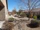 Backyard features low maintenance desert landscaping at 6143 Majestic Wind Ave, Las Vegas, NV 89122