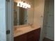 Bathroom featuring double sinks, large mirror and ample lighting at 6143 Majestic Wind Ave, Las Vegas, NV 89122