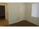 Carpeted bedroom with neutral paint, a window, and a closet at 6143 Majestic Wind Ave, Las Vegas, NV 89122