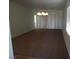 Spacious living room featuring neutral carpet and ample natural light at 6143 Majestic Wind Ave, Las Vegas, NV 89122