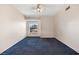 Bedroom with carpet, ceiling fan, and a window bringing in natural light at 6701 Dorita Ave # 202, Las Vegas, NV 89108
