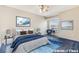 Cozy bedroom with a comfortable bed, stylish decor, and a window offering natural light at 6701 Dorita Ave # 202, Las Vegas, NV 89108