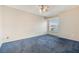 This bedroom features plush carpets, neutral paint and natural light at 6701 Dorita Ave # 202, Las Vegas, NV 89108
