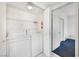 Laundry room with washer, dryer, and shelving at 6701 Dorita Ave # 202, Las Vegas, NV 89108