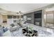 Bright living room featuring plush seating, fireplace, and seamless flow into the dining area at 6701 Dorita Ave # 202, Las Vegas, NV 89108