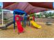 Community playground featuring slides, climbing structures, and shade covering at 689 Lucky Pine St, Henderson, NV 89002