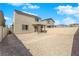 Large backyard with fence and covered patio at 7022 Feather Hill St, North Las Vegas, NV 89086