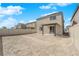 Backyard with fence and covered patio at 7022 Feather Hill St, North Las Vegas, NV 89086