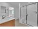 Spacious bathroom features double sinks and a glass-enclosed shower at 7022 Feather Hill St, North Las Vegas, NV 89086