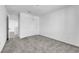 Bedroom features carpet flooring, light walls, and double-door closet space at 7022 Feather Hill St, North Las Vegas, NV 89086