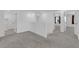 Upstairs hallway featuring neutral colors, carpet, and access to the bedrooms and laundry room at 7022 Feather Hill St, North Las Vegas, NV 89086