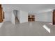 Spacious living area boasts neutral tile floors and a staircase, perfect for entertaining and relaxation at 7022 Feather Hill St, North Las Vegas, NV 89086