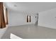 Spacious living room features tile flooring, natural light, and staircase access to the upper level at 7022 Feather Hill St, North Las Vegas, NV 89086