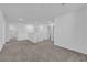 Upstairs loft area with plush carpet, neutral walls and easy access to bedrooms and laundry at 7022 Feather Hill St, North Las Vegas, NV 89086