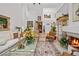 Elegant living room with high ceilings, a fireplace, and stylish furnishings at 7889 Harbour Towne Ave, Las Vegas, NV 89113