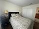 Bedroom showcasing a comfortable bed with decorative pillows and bedside lamps at 8396 Yamhill St, Las Vegas, NV 89123