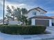 Charming two-story home with a well-maintained lawn and a two-car garage in a residential neighborhood at 8396 Yamhill St, Las Vegas, NV 89123
