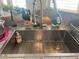 Modern kitchen sink with stainless steel fixtures and ample countertop space at 8396 Yamhill St, Las Vegas, NV 89123