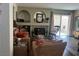 Cozy living room featuring a fireplace, comfortable seating, and stylish decor at 8396 Yamhill St, Las Vegas, NV 89123