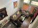 Bright and airy living room boasts hardwood floors, neutral paint, and comfortable seating arrangements at 8396 Yamhill St, Las Vegas, NV 89123