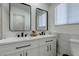 Modern bathroom featuring a double vanity with sleek black hardware and minimalist design at 8901 Dio Guardi Dr, Las Vegas, NV 89117