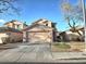 Charming two-story home featuring a spacious two-car garage and well-maintained landscaping at 9662 Allison Ranch Ave, Las Vegas, NV 89148