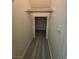 Hallway featuring gray wood flooring with a walk-in closet at 9662 Allison Ranch Ave, Las Vegas, NV 89148