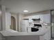 Bright kitchen with modern white cabinets, countertops, and ample counter space at 9662 Allison Ranch Ave, Las Vegas, NV 89148
