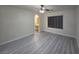 Living room featuring gray floors and a ceiling fan at 9662 Allison Ranch Ave, Las Vegas, NV 89148