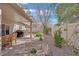 Home backyard features covered patio, and lush, mature trees at , Las Vegas, NV 89131