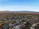 Beautiful aerial of desert community featuring a golf course and lovely homes at 10 Greely Club Trl, Henderson, NV 89052