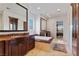 Beautiful bathroom with a large tub, vanity with mirror, and cabinet space at 10 Greely Club Trl, Henderson, NV 89052