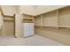 Walk-in closet offers ample storage space with built-in shelving and drawers at 10 Greely Club Trl, Henderson, NV 89052