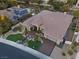 Aerial view of a luxurious desert home with well-manicured landscaping at 10 Greely Club Trl, Henderson, NV 89052
