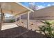 Paver patio in a desert landscaped backyard with privacy fencing at 1009 Fishing St, Henderson, NV 89011